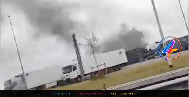 Ajax and Feyenoord Fans Clash, Car Burns at Highway Station